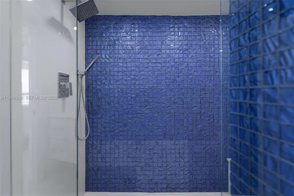a brick wall in a bathroom