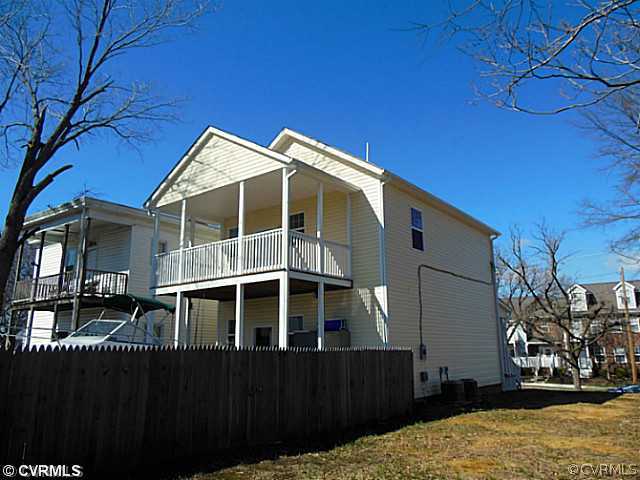 1108 Decatur Street Richmond, VA 23224 - Photo 3 of 24 a front view of a house with a yard