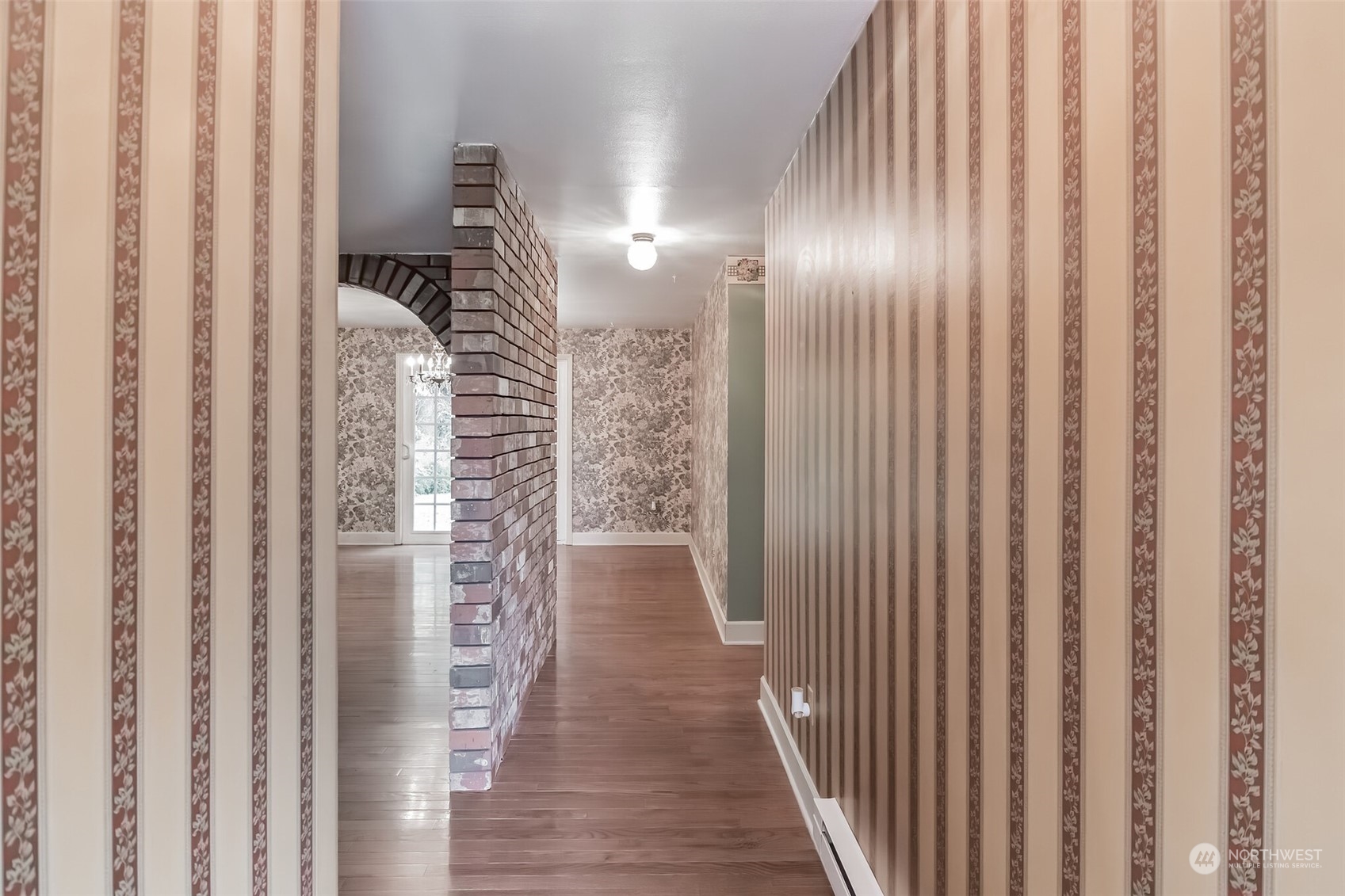 7920 187th Avenue Southwest Rochester, WA 98579 - Photo 11 of 28 a view of gallery with wooden floor