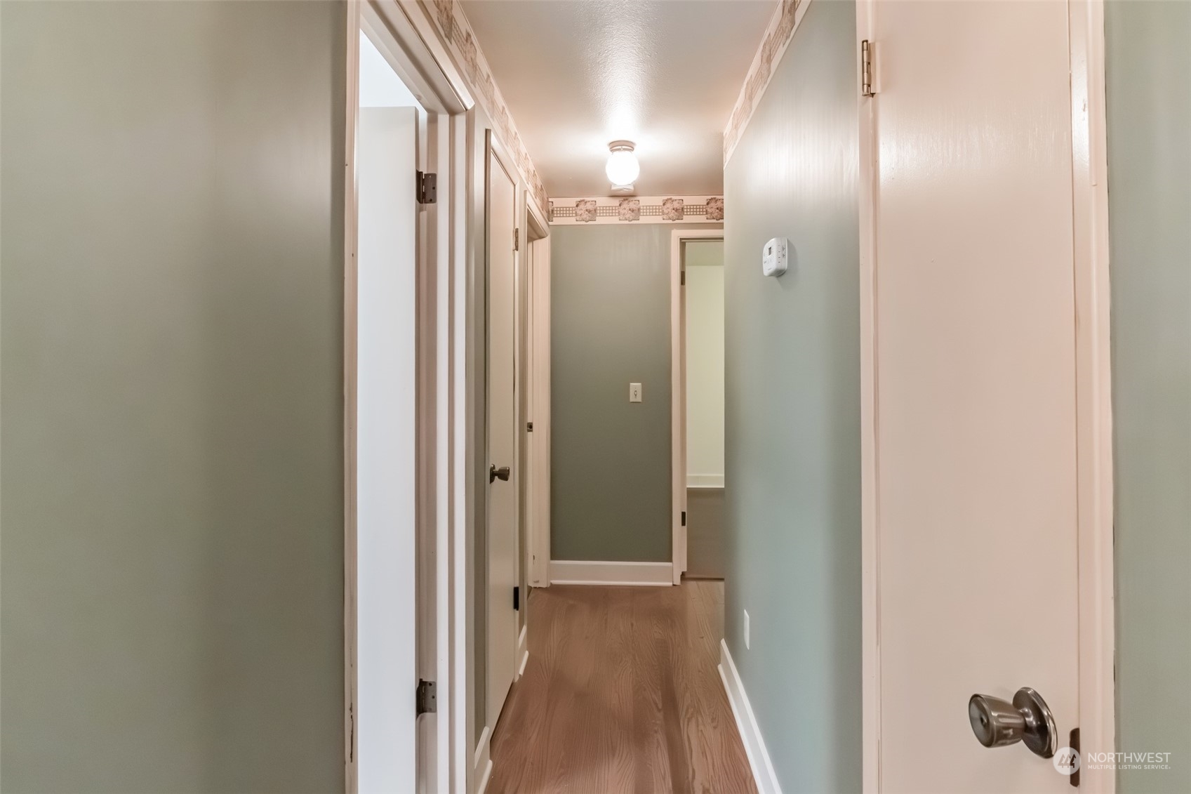 7920 187th Avenue Southwest Rochester, WA 98579 - Photo 13 of 28 a view of a bathroom from a hallway