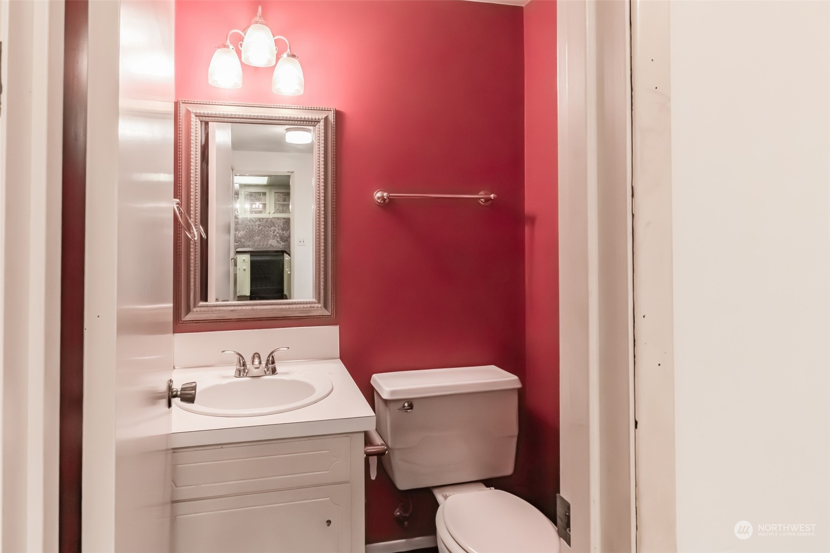 7920 187th Avenue Southwest Rochester, WA 98579 - Photo 14 of 28 a bathroom with a sink toilet and mirror