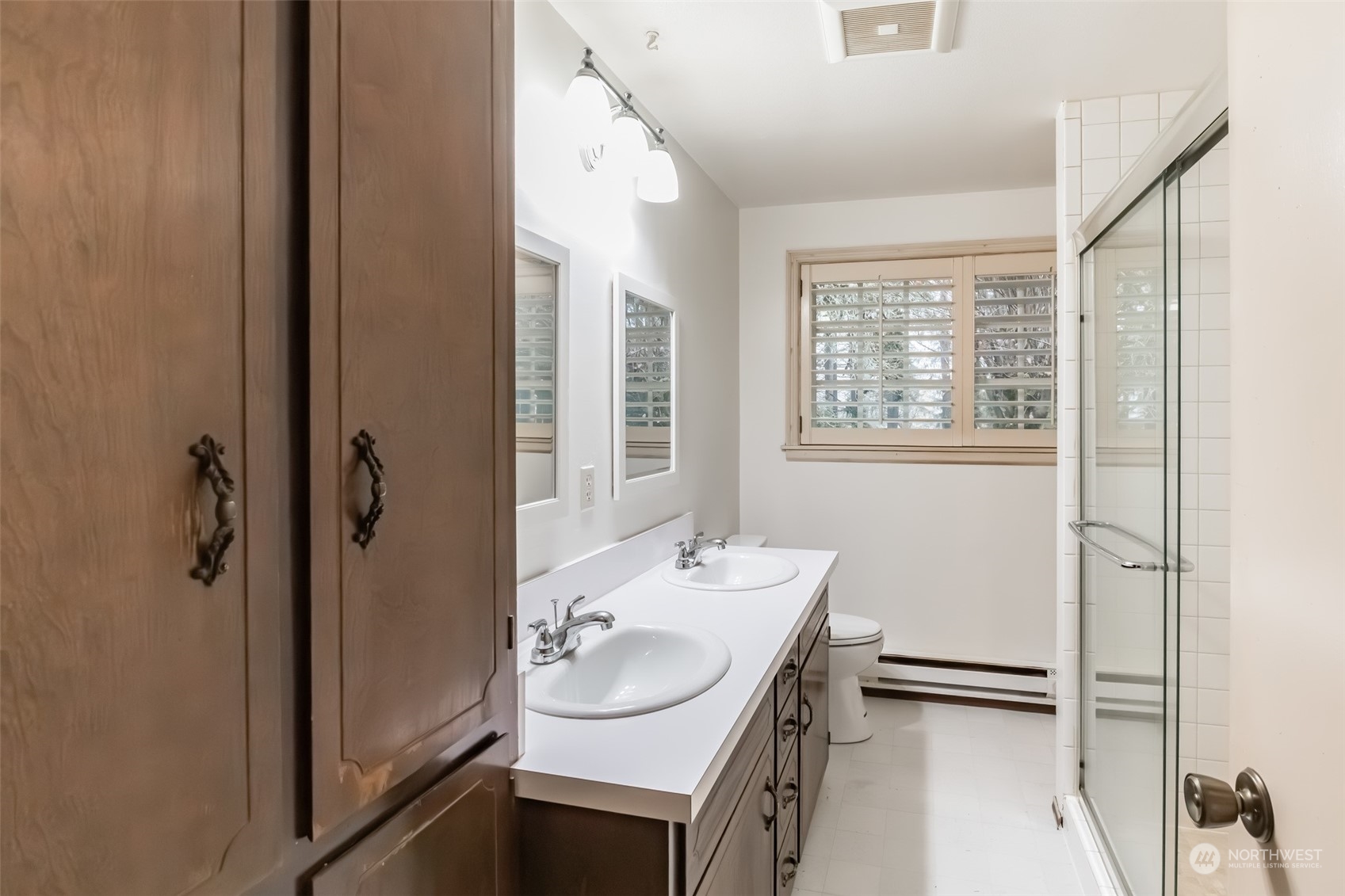 7920 187th Avenue Southwest Rochester, WA 98579 - Photo 15 of 28 a bathroom with a sink a toilet and shower