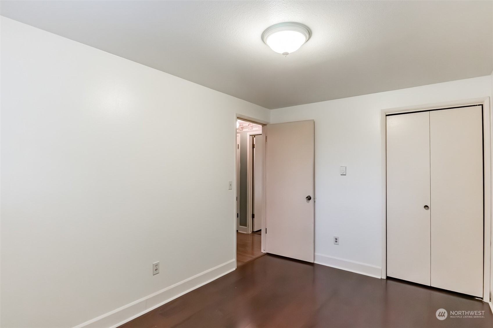 7920 187th Avenue Southwest Rochester, WA 98579 - Photo 17 of 28 an empty room with wooden floor