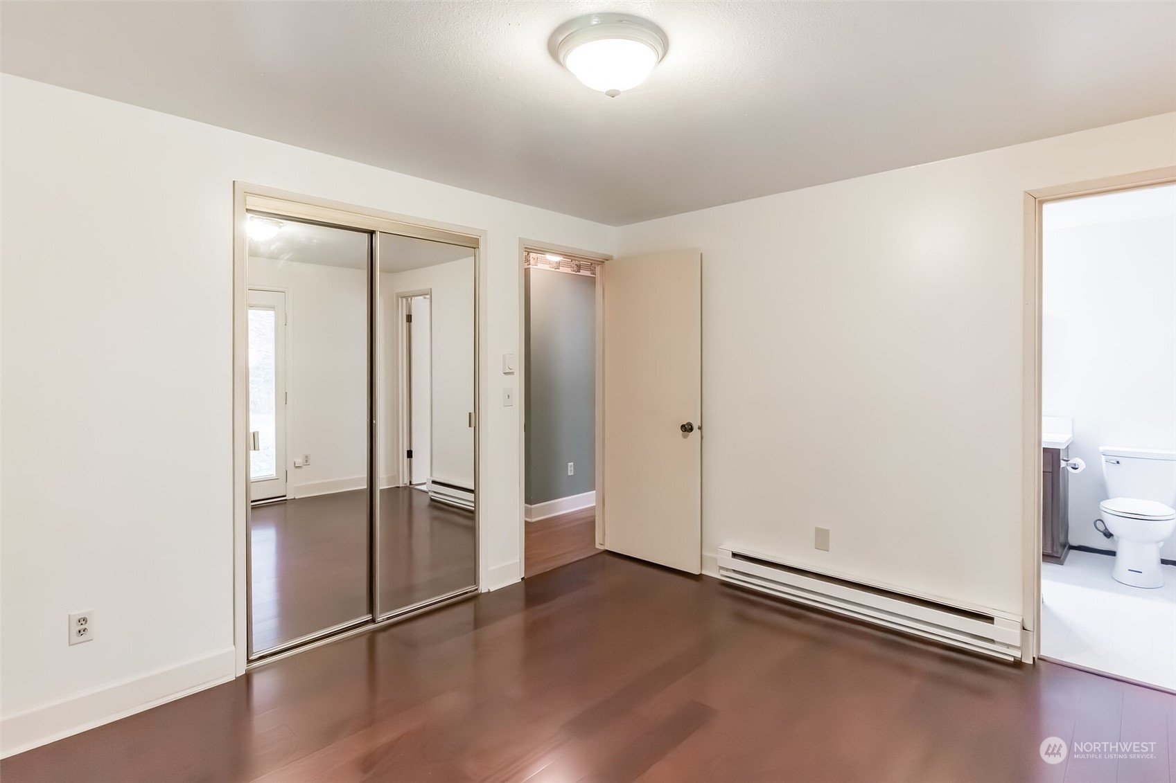 7920 187th Avenue Southwest Rochester, WA 98579 - Photo 19 of 28 an empty room with wooden floor