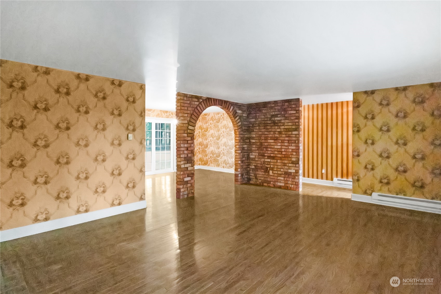 7920 187th Avenue Southwest Rochester, WA 98579 - Photo 6 of 28 wooden floor in an empty room with a window