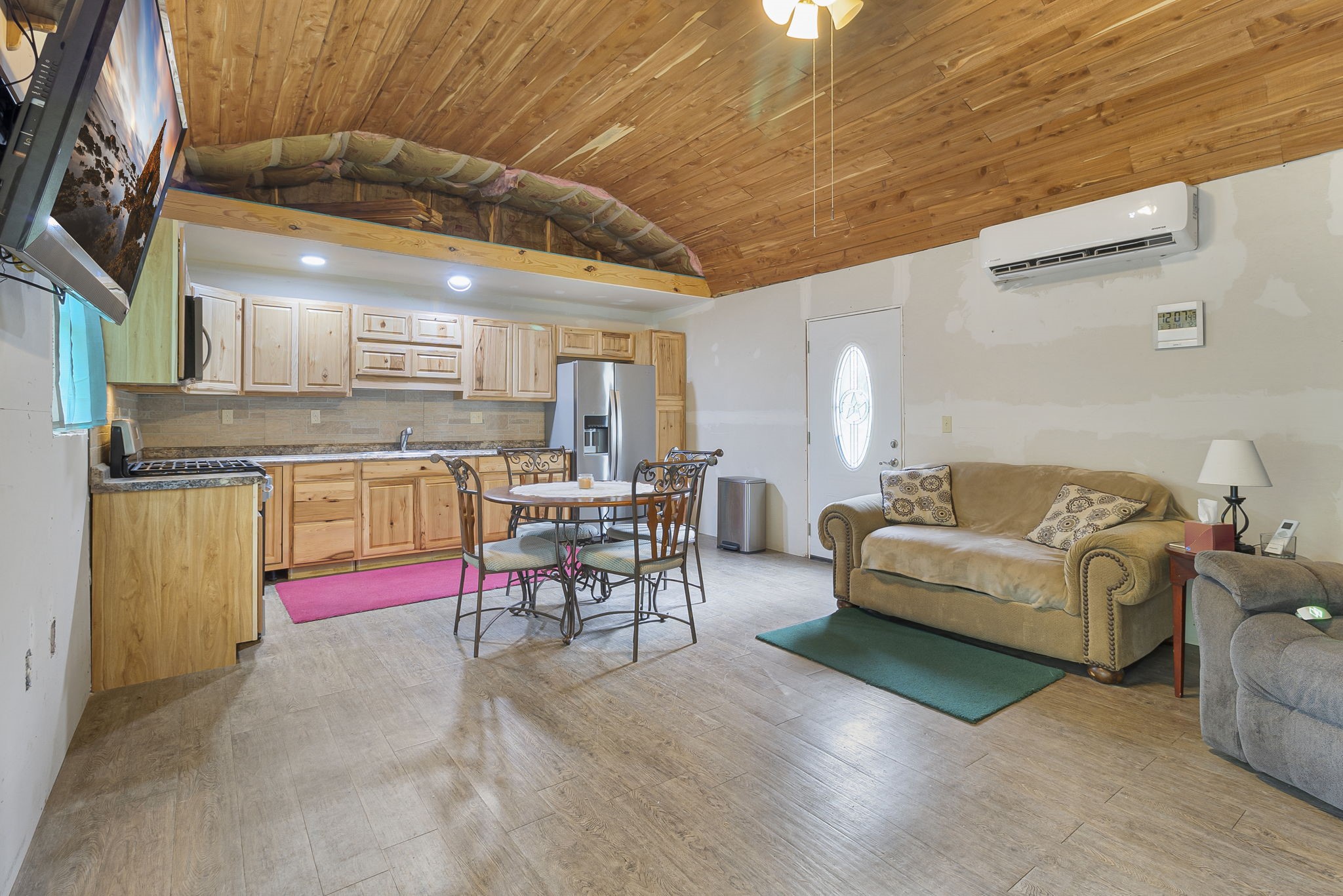 300 Collier Road Point Blank, TX 77364 - Photo 22 of 49 a living room with furniture and kitchen view