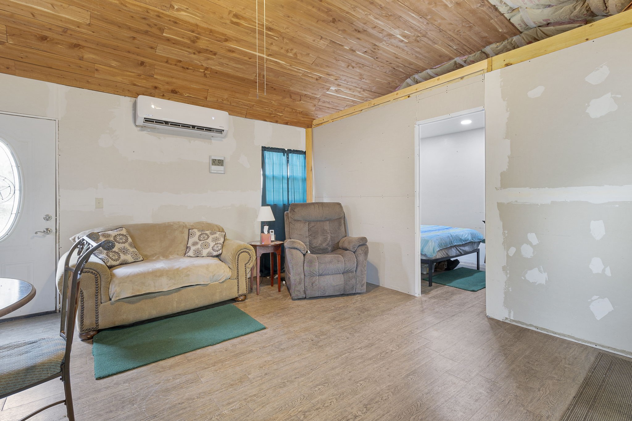 300 Collier Road Point Blank, TX 77364 - Photo 25 of 49 a living room with furniture and a couch