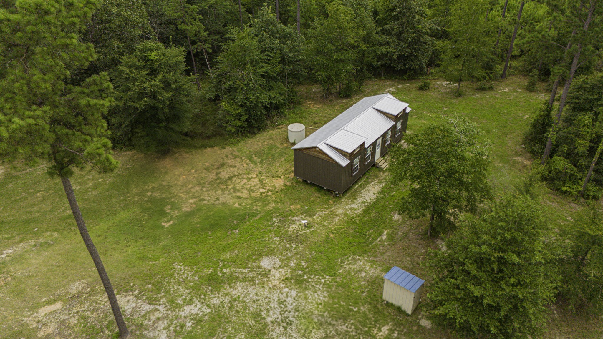 300 Collier Road Point Blank, TX 77364 - Photo 7 of 49 a view of a yard with chairs