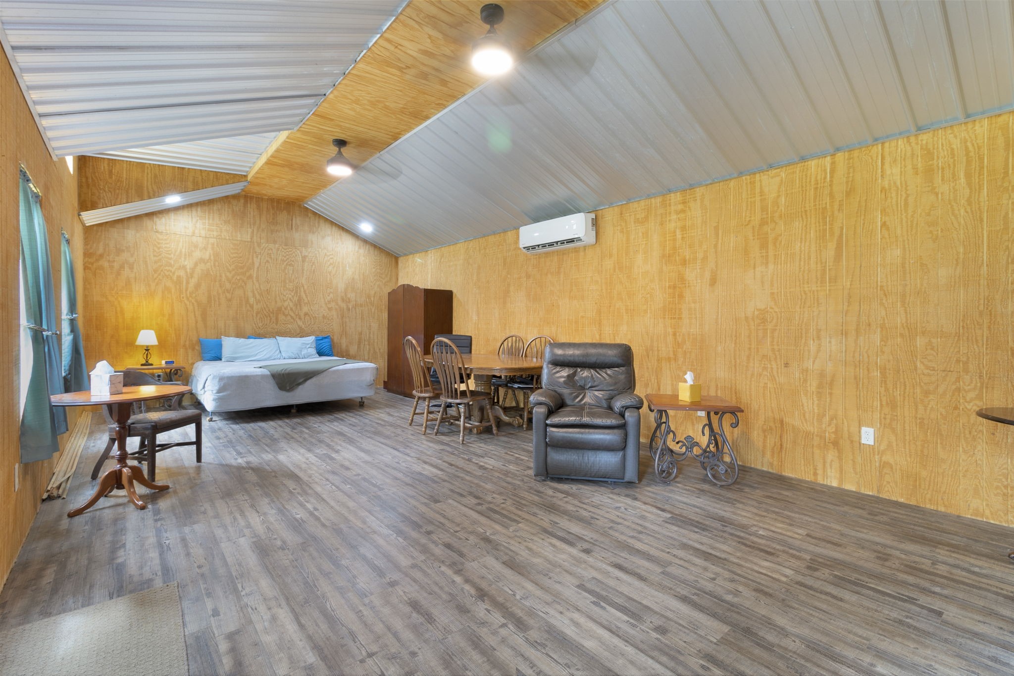 300 Collier Road Point Blank, TX 77364 - Photo 8 of 49 a living room with furniture and a wooden floor