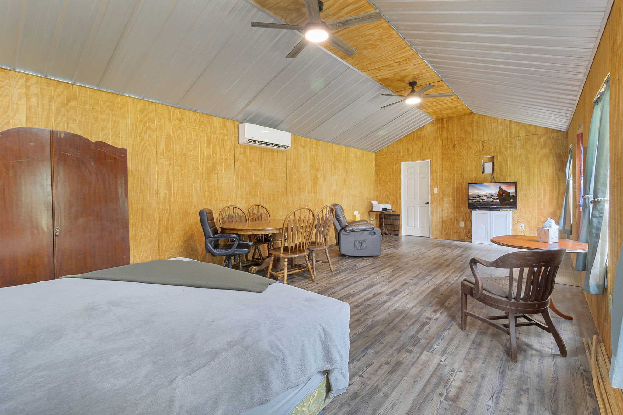 300 Collier Road Point Blank, TX 77364 - Photo 10 of 49 a view of a patio with table and chairs and potted plants