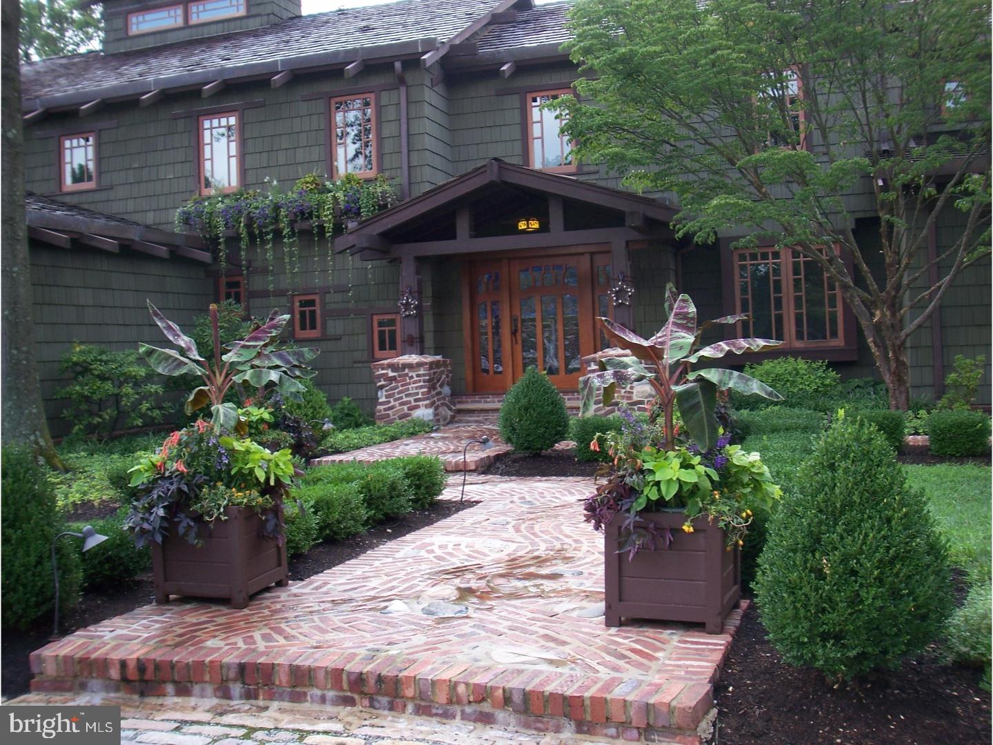 6279 Pidcock Creek Road New Hope, PA 18938 - Photo 10 of 25 a front view of a house with a garden