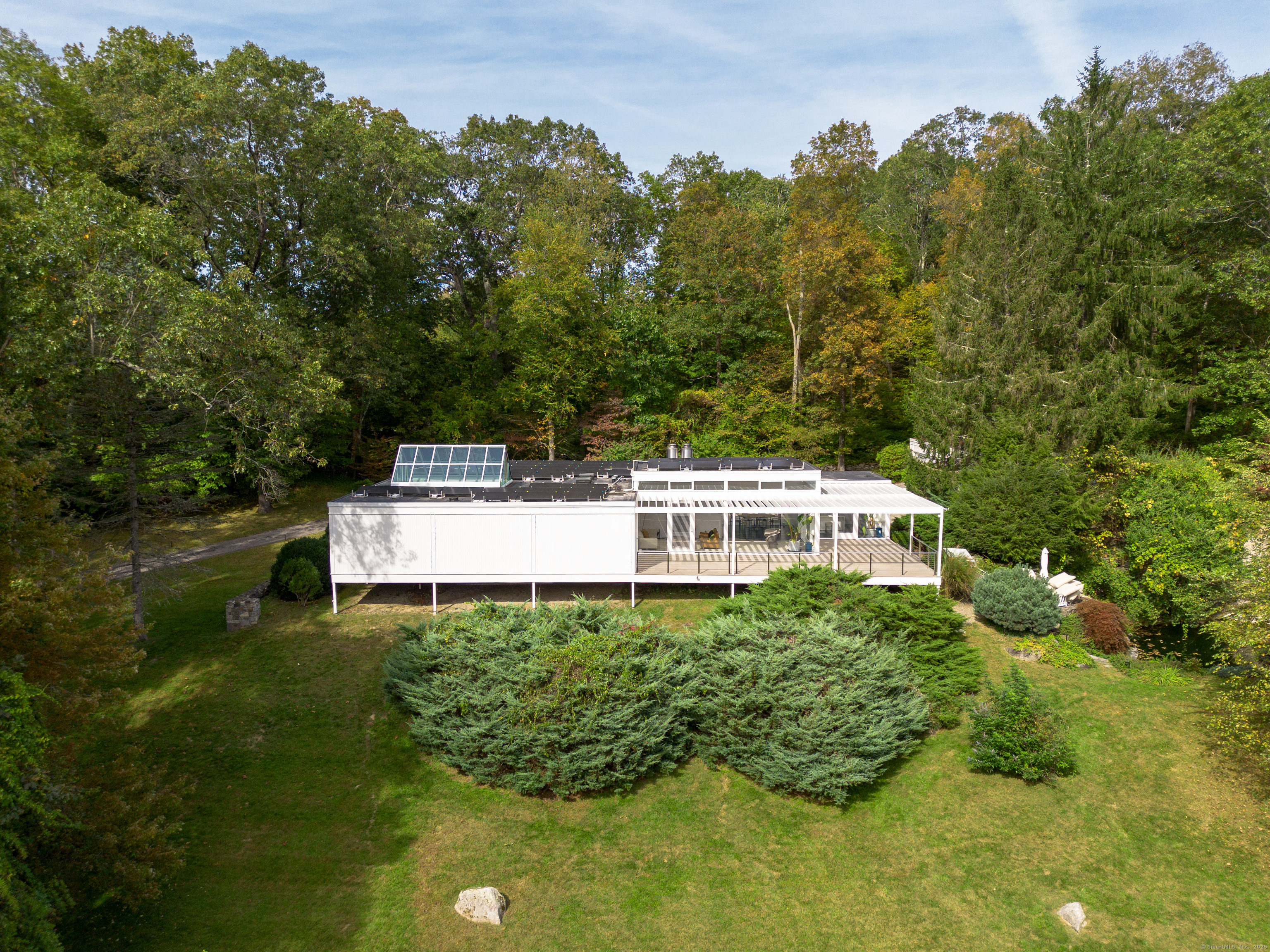 26 Chalburn Road Redding, CT 06896 - Photo 24 of 27 a view of a house with a yard