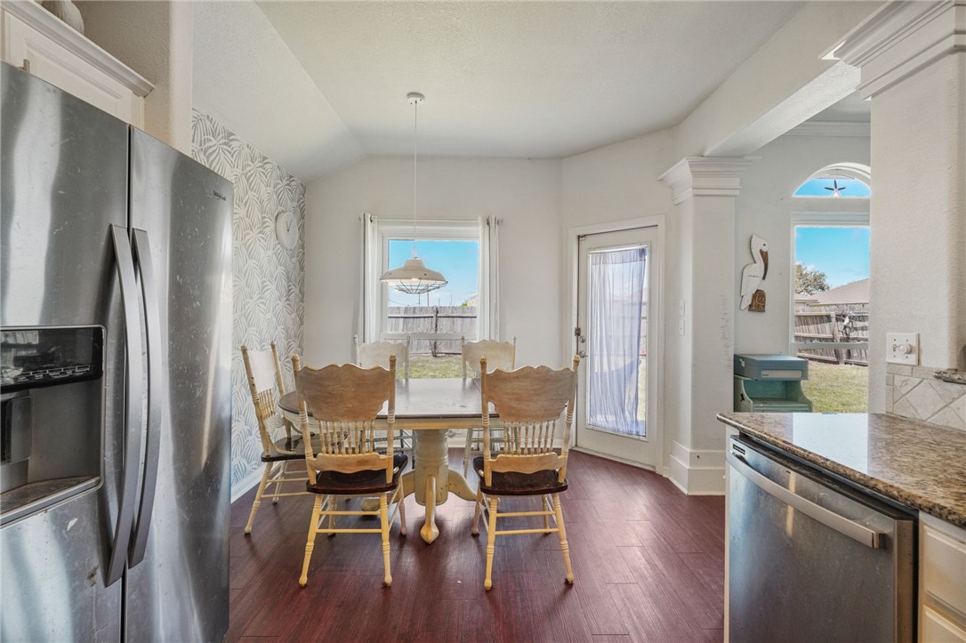 1000 Imperial Street Portland, TX 78374 - Photo 13 of 26 a dining room with furniture and wooden floor