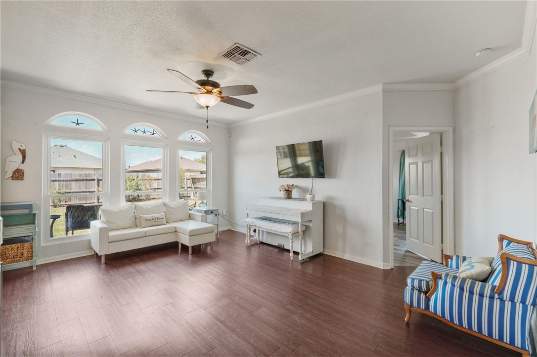 1000 Imperial Street Portland, TX 78374 - Photo 15 of 26 a living room with furniture and wooden floor