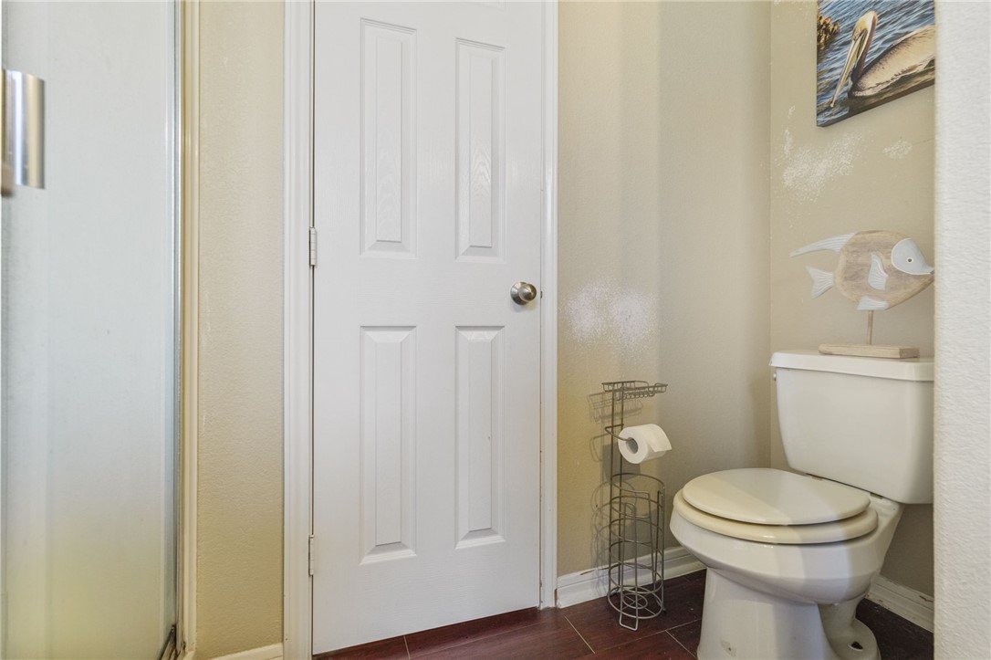 1000 Imperial Street Portland, TX 78374 - Photo 21 of 26 a bathroom with a toilet and a shower
