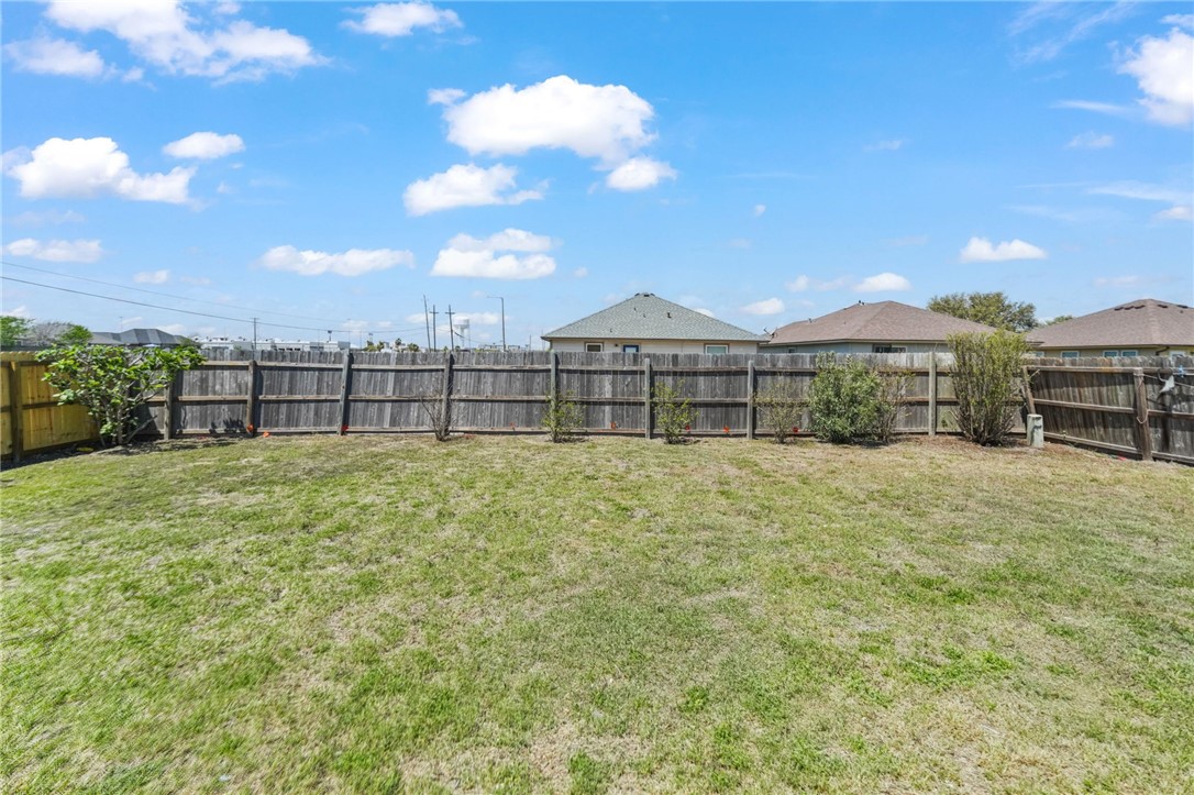 1000 Imperial Street Portland, TX 78374 - Photo 25 of 26 a view of a backyard with a garden and entertaining space