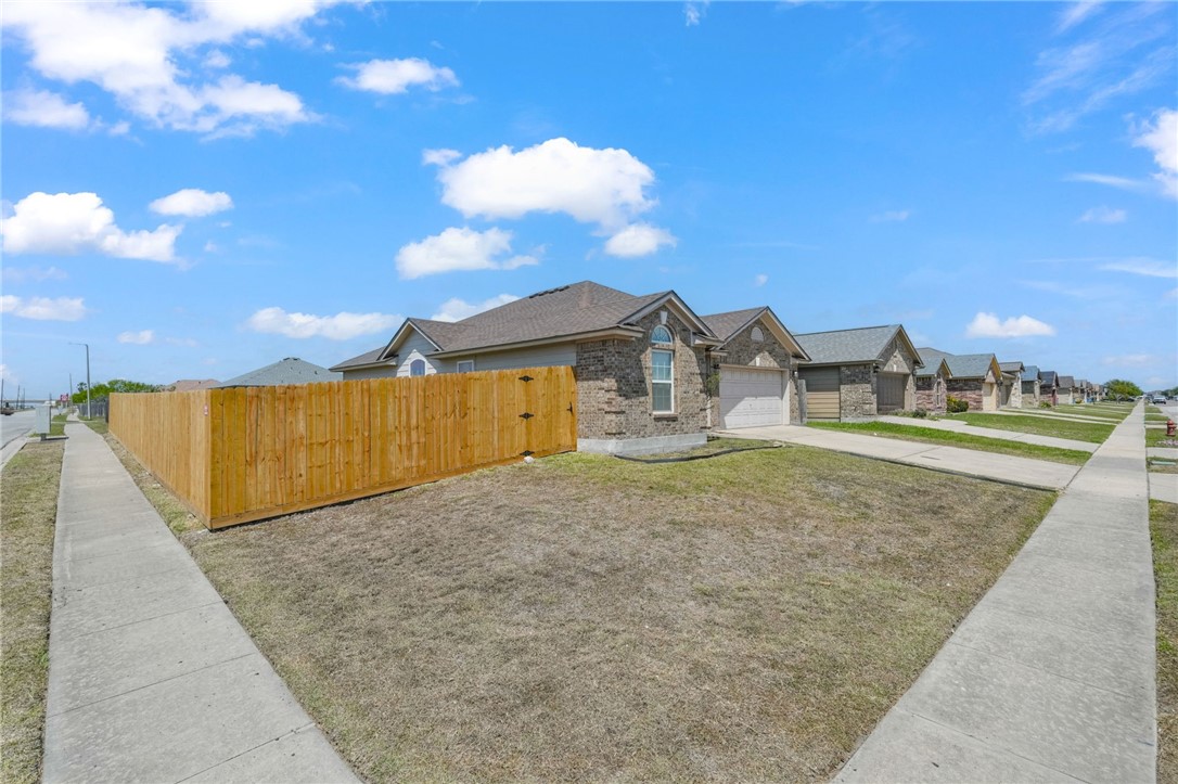 1000 Imperial Street Portland, TX 78374 - Photo 26 of 26 a view of a house with a yard