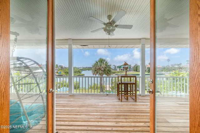 a bathroom with a granite countertop toilet a sink and a mirror