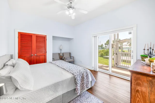 a view of a balcony with wooden floor