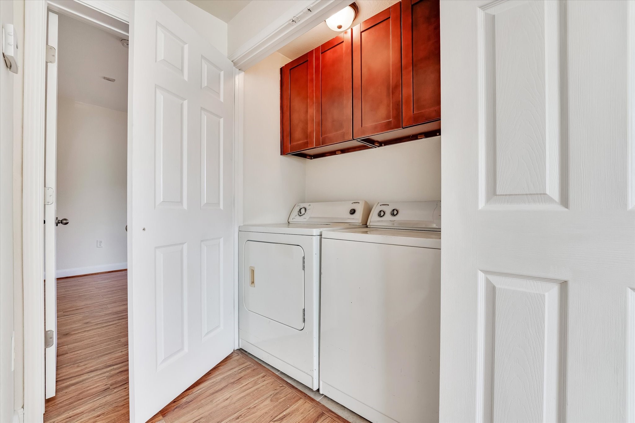 10102 Neuens Road, Unit B300 Houston, TX 77080 - Photo 13 of 18 a utility room with dryer and washer