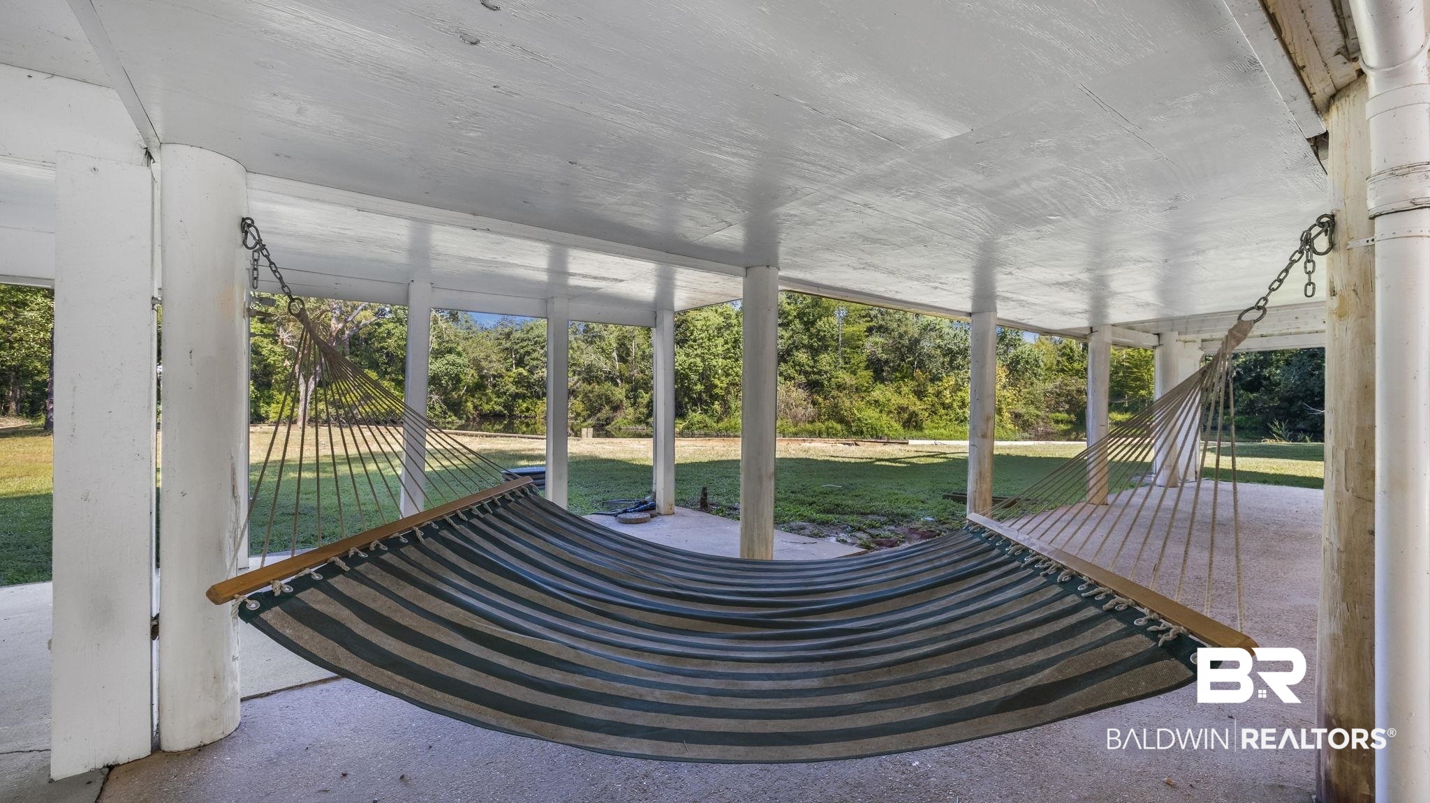 12855 Woodhaven Dairy Road West Silverhill, AL 36576 - Photo 6 of 27 Unfurnished sunroom featuring a patio area