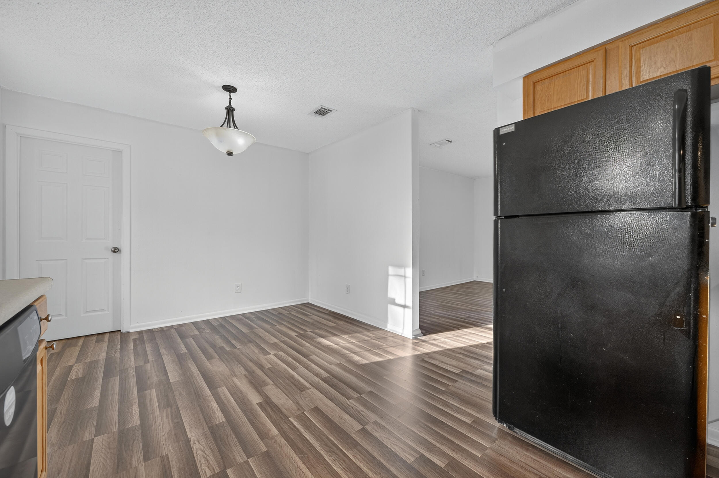552 Roberts Drive DeFuniak Springs, FL 32433 - Photo 17 of 40 a view of empty room with wooden floor