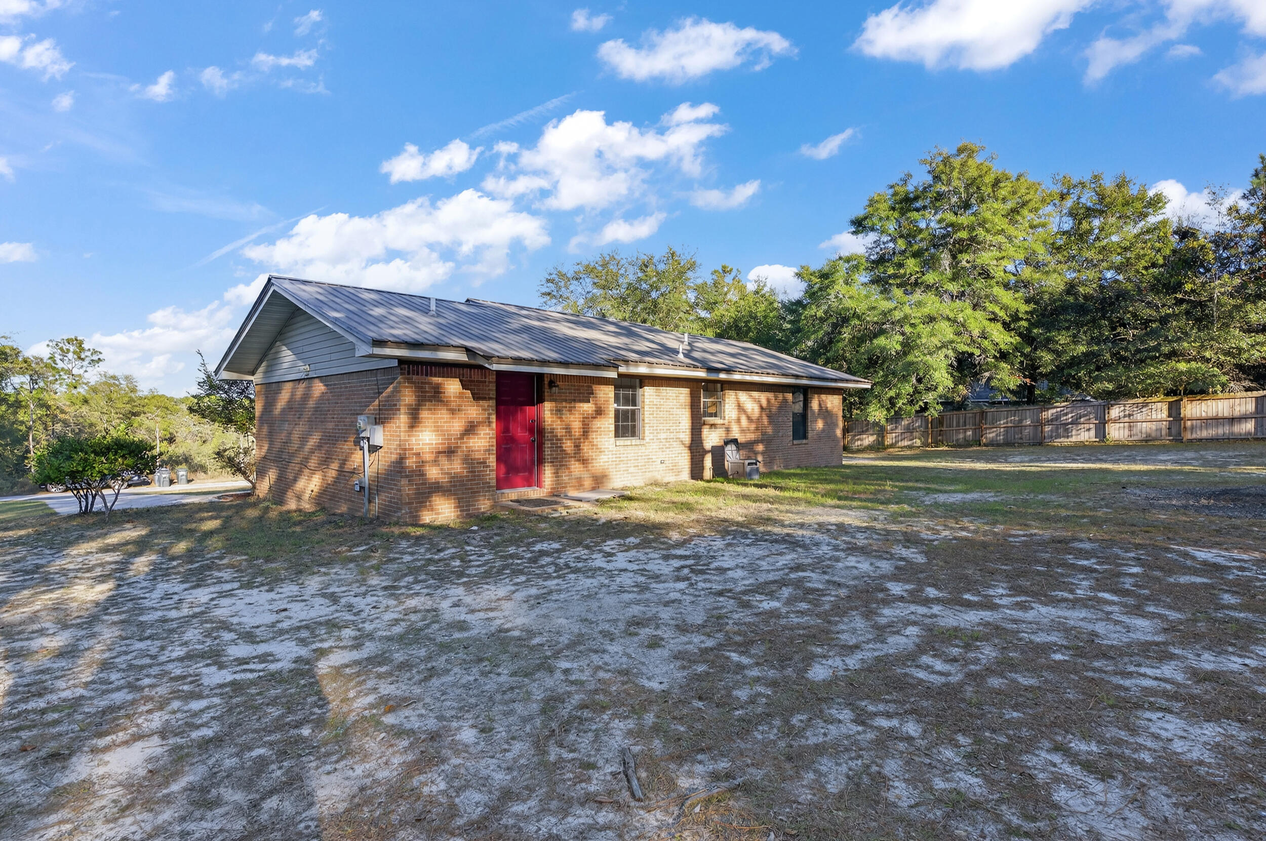 552 Roberts Drive DeFuniak Springs, FL 32433 - Photo 33 of 40 a view of backyard of house with green space