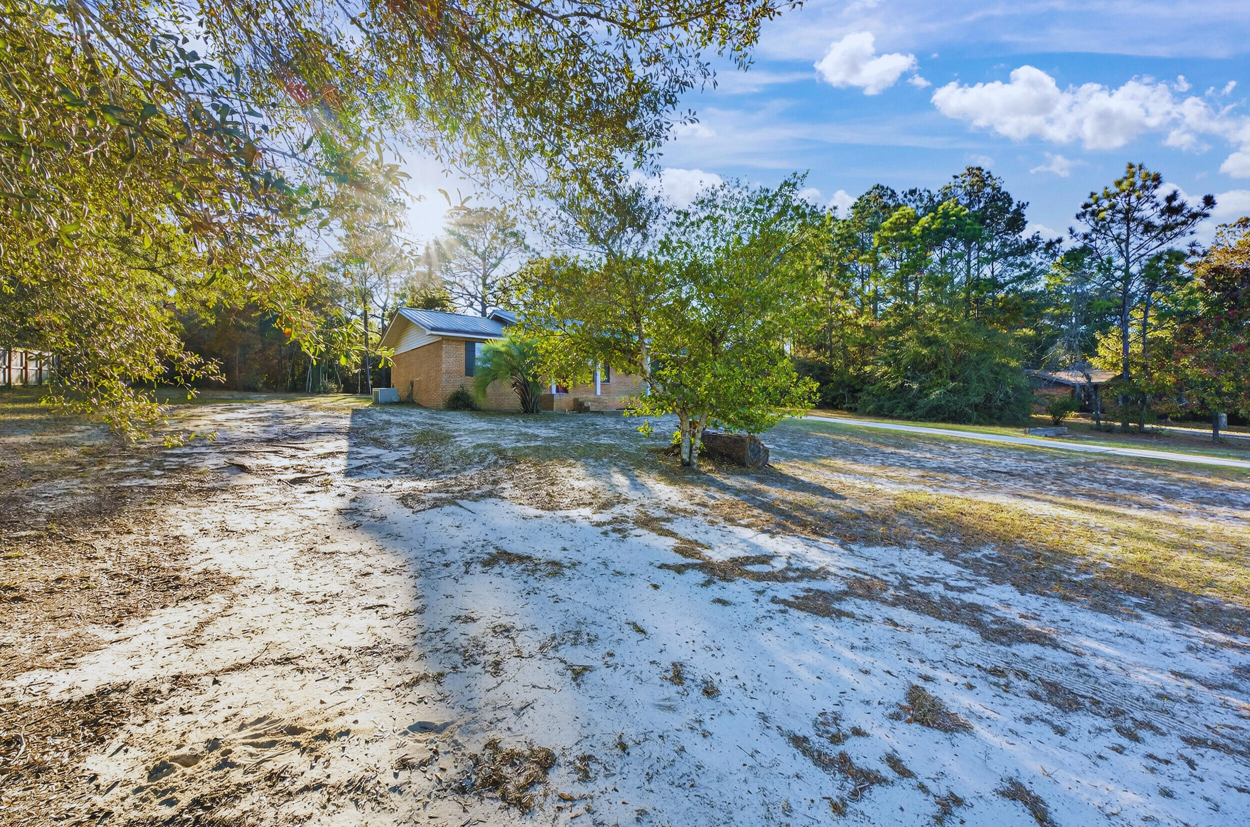 552 Roberts Drive DeFuniak Springs, FL 32433 - Photo 4 of 40 a view of a house with a yard