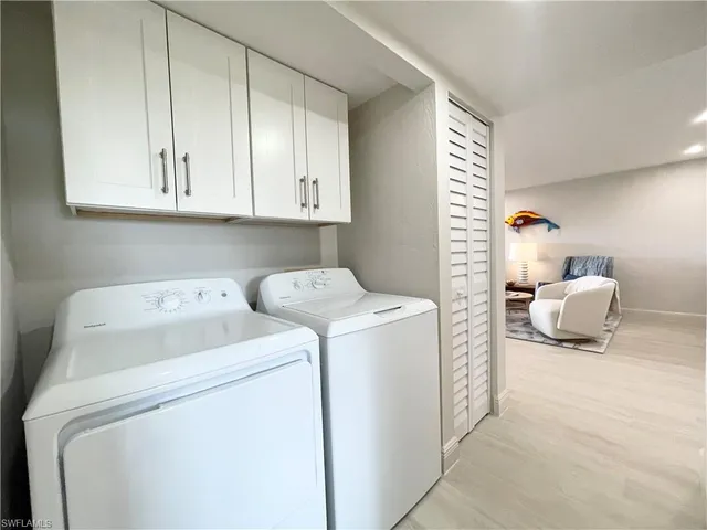 a bedroom with a bed and a mirror