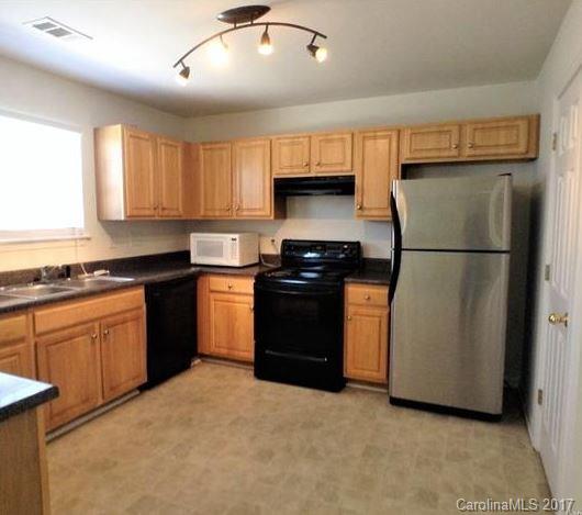 194 Scanlon Road Mooresville, NC 28115 - Photo 2 of 9 a kitchen with a refrigerator stove and sink