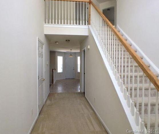 194 Scanlon Road Mooresville, NC 28115 - Photo 9 of 9 a view of staircase with railing and white walls