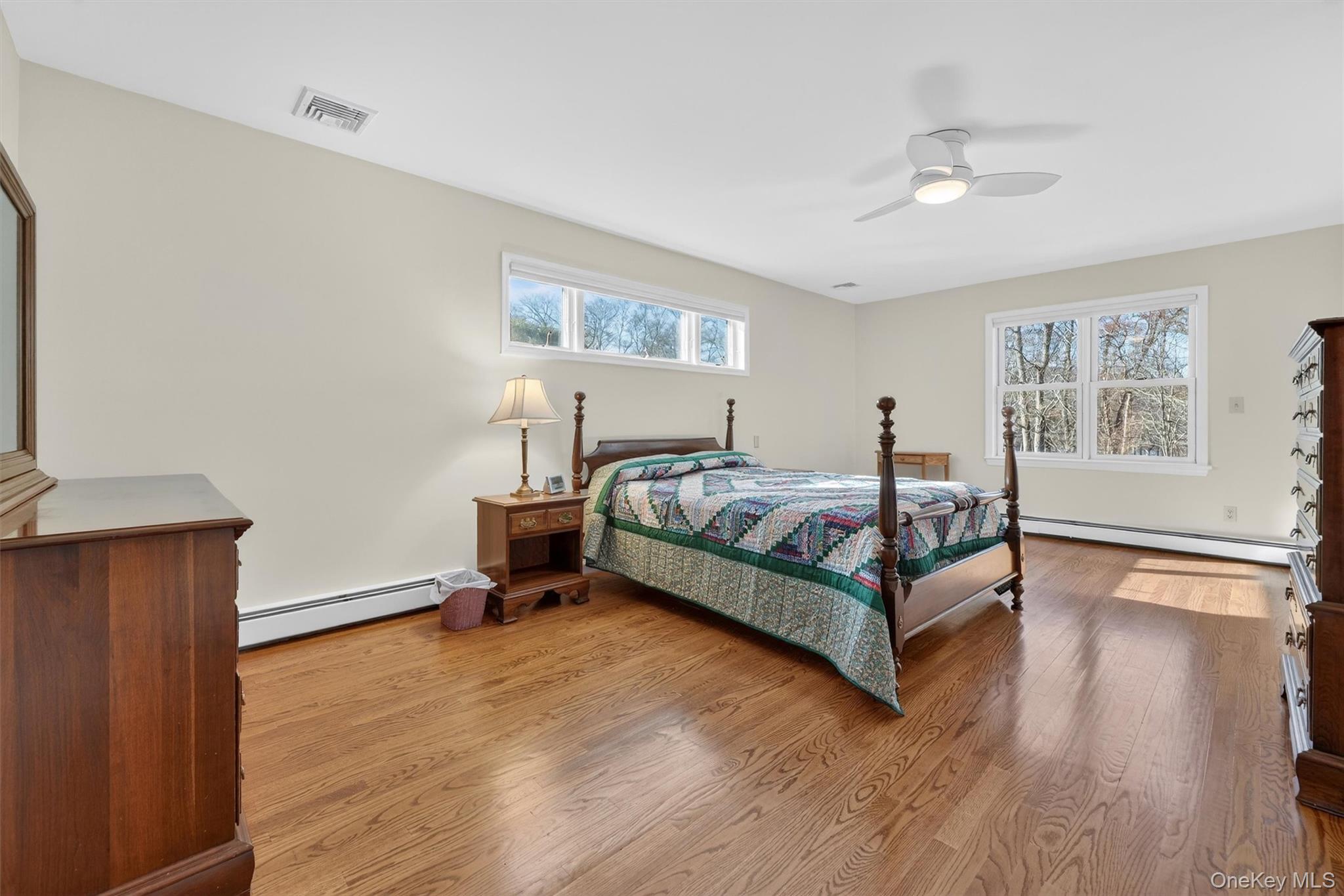 1166 Hunterbrook Road Yorktown Heights, NY 10598 - Photo 13 of 36 a bedroom with a bed and window