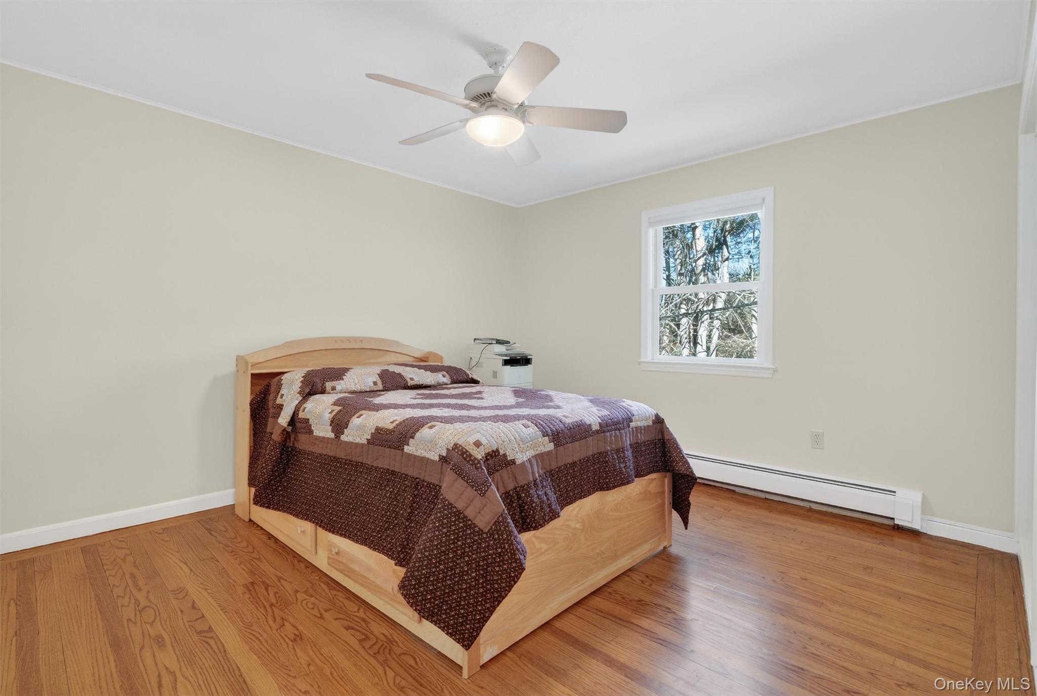 1166 Hunterbrook Road Yorktown Heights, NY 10598 - Photo 18 of 36 a bedroom with a bed and a window