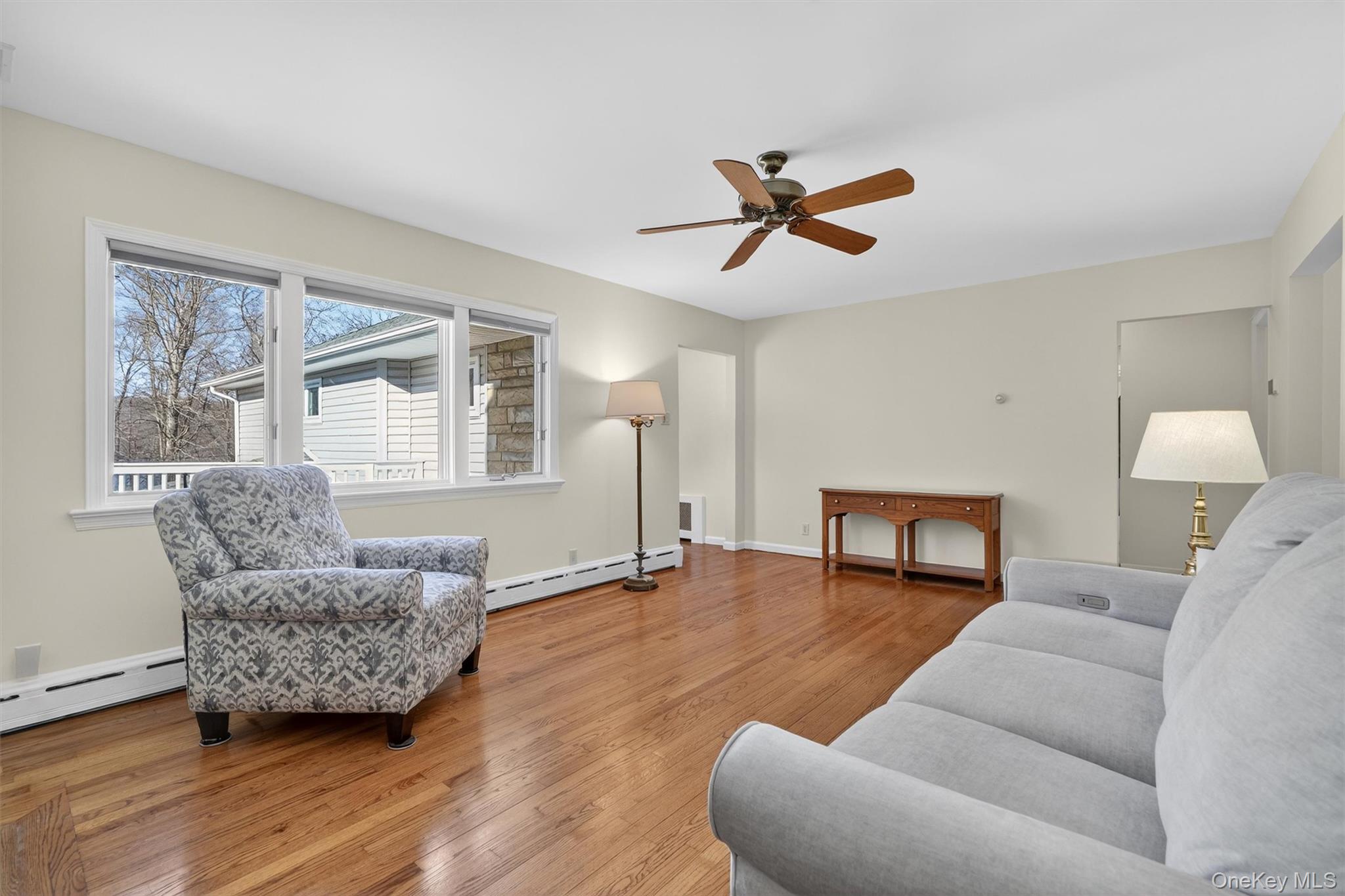 1166 Hunterbrook Road Yorktown Heights, NY 10598 - Photo 5 of 36 a living room with furniture and a window
