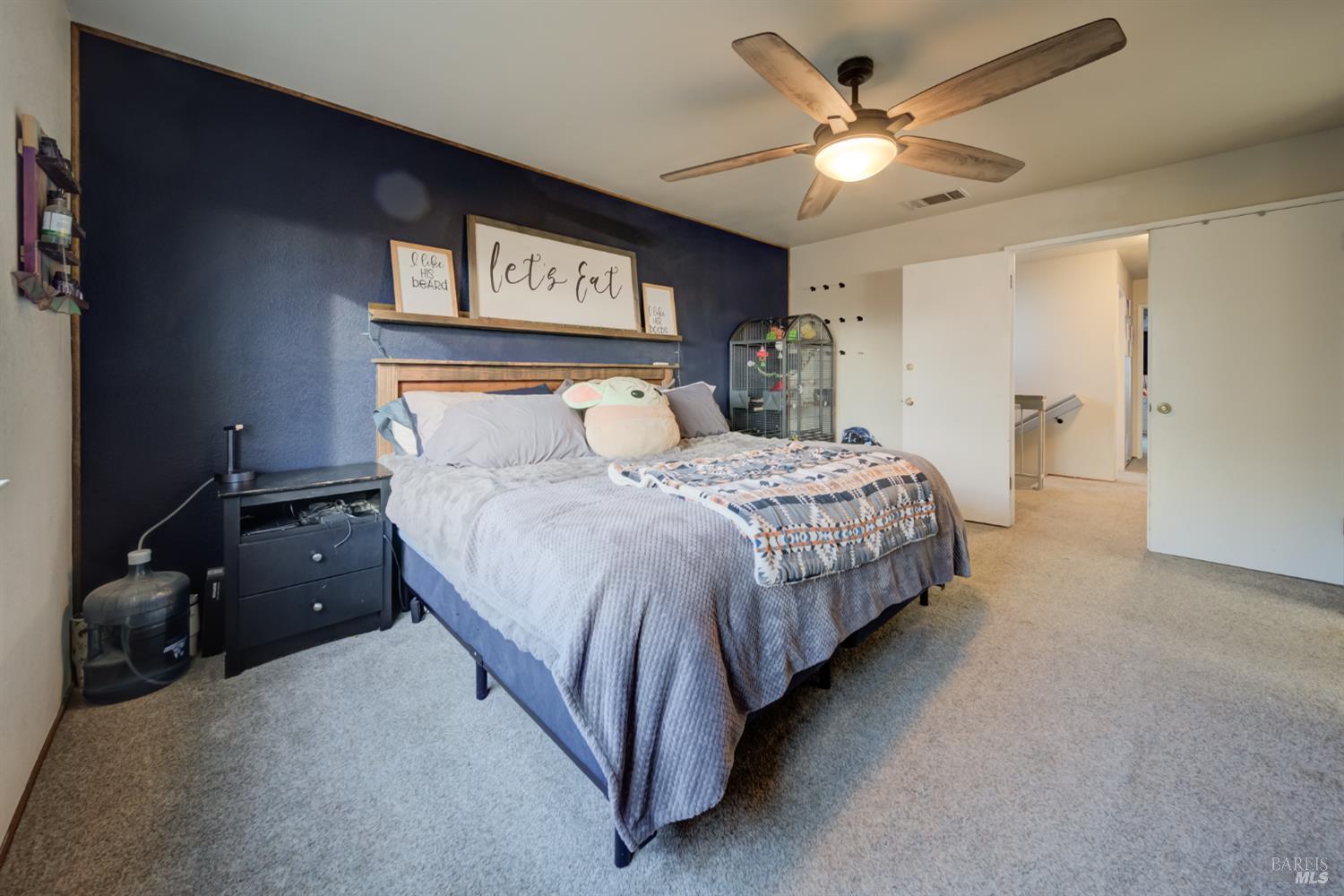 989 Suffolk Way Fairfield, CA 94533 - Photo 25 of 30 a bedroom with a bed and a ceiling fan