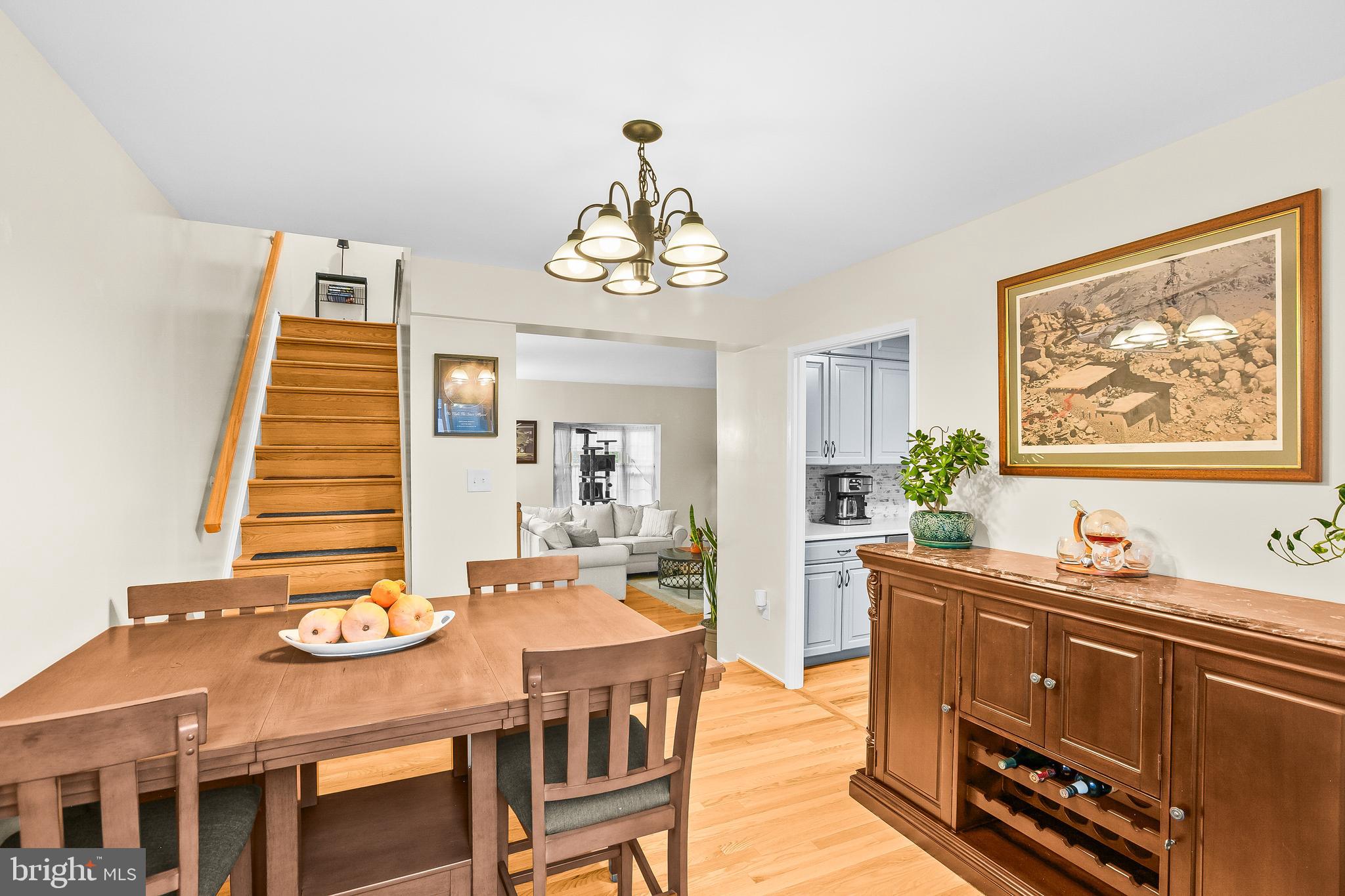 2418 Ridgehampton Court Reston, VA 20191 - Photo 11 of 28 a dining room with wooden floor and breakfast area