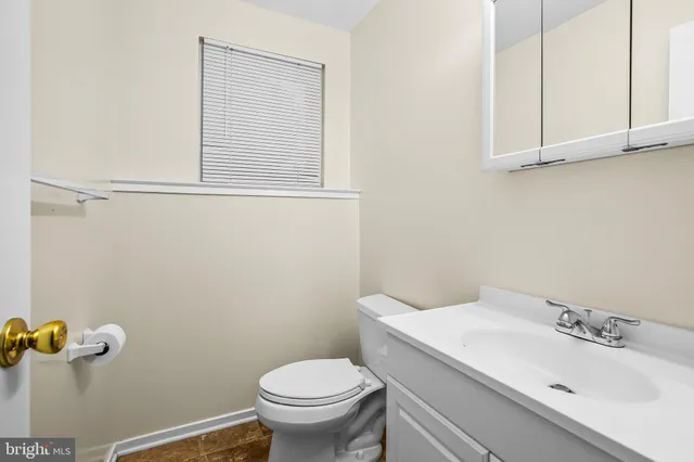 a bathroom with a sink and a toilet