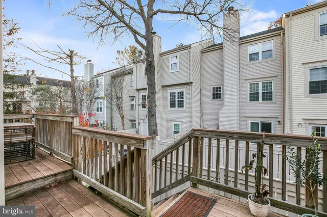 a view of a brick building from a balcony