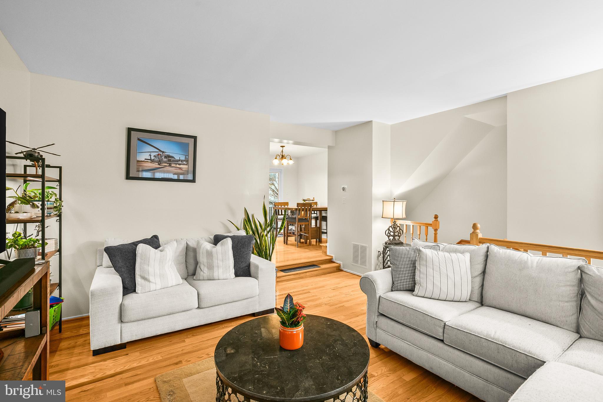 2418 Ridgehampton Court Reston, VA 20191 - Photo 8 of 28 a living room with furniture and a couch