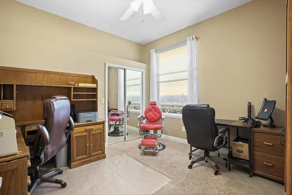 a kitchen with stainless steel appliances kitchen island granite countertop a stove a sink and a microwave