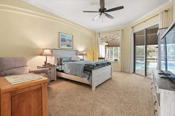 a spacious bathroom with a tub a mirror and a shower