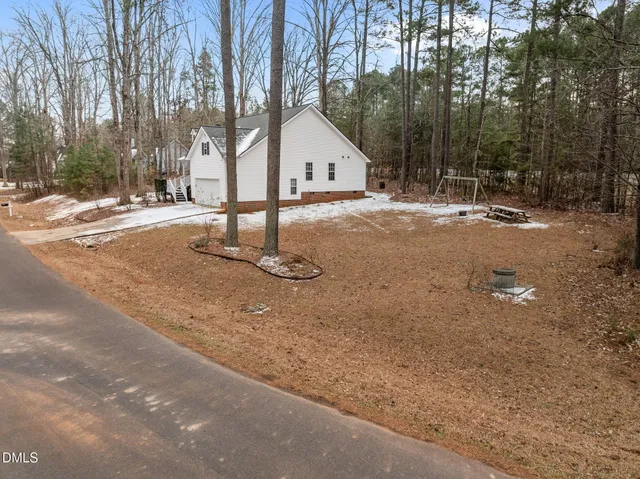a house with trees in front of it