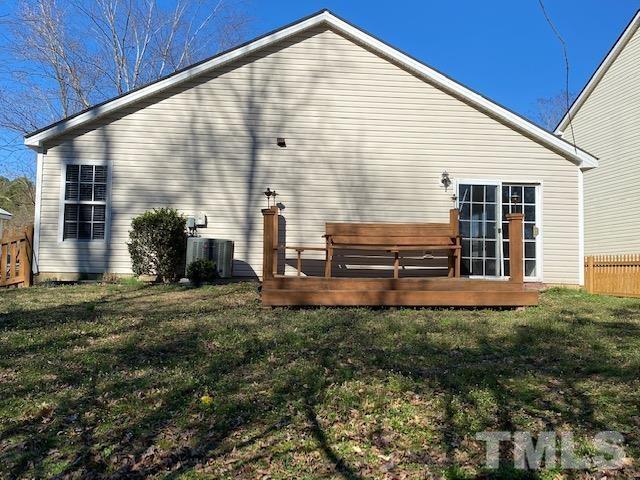 506 Homestead Park Drive Apex, NC 27502 - Photo 15 of 18 a view of backyard of house