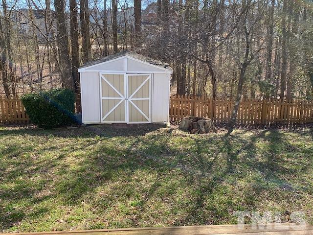 506 Homestead Park Drive Apex, NC 27502 - Photo 16 of 18 a front view of a house with garden