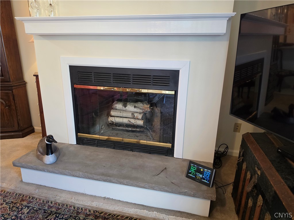 6147 Diffin Road Cicero, NY 13039 - Photo 16 of 45 Woodburning fireplace