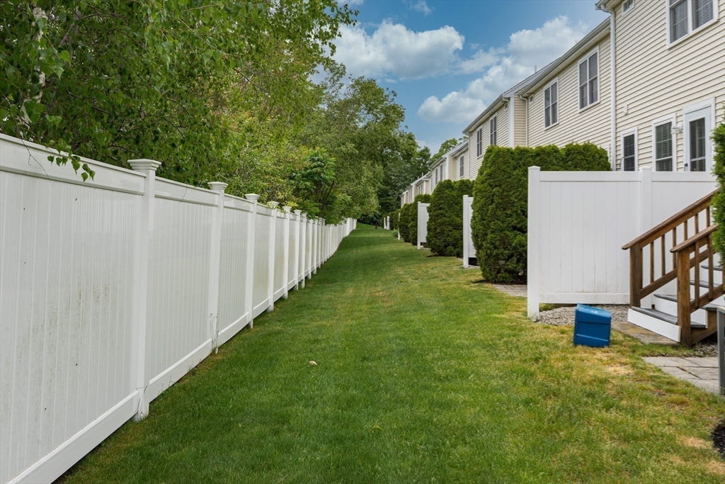 3 Boxberry Lane, Unit 3 Rockland, MA 02370 - Photo 18 of 18 a view of a house with a yard