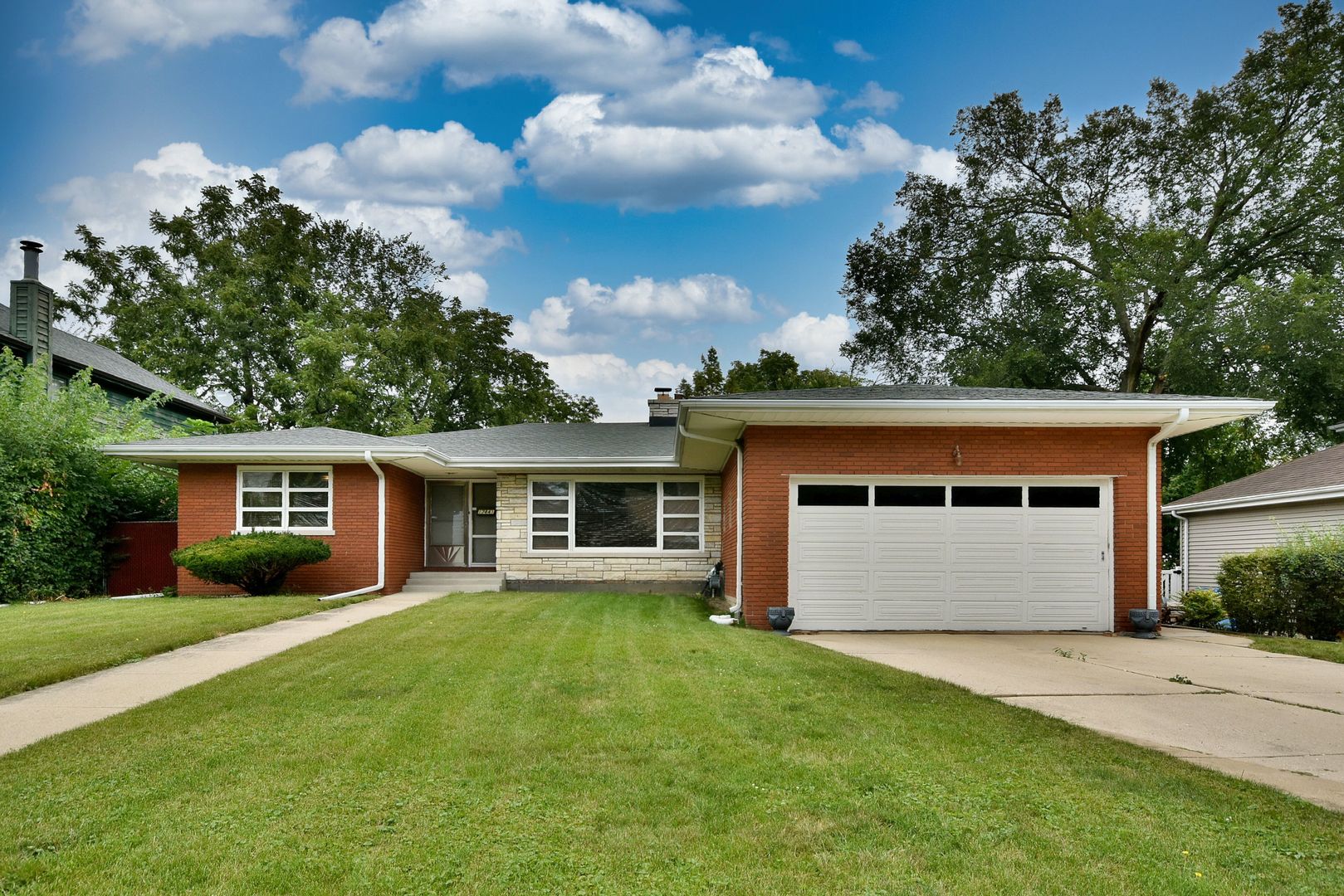 17841 Howe Avenue Homewood, IL 60430 - Photo 1 of 38 front view of house with a yard