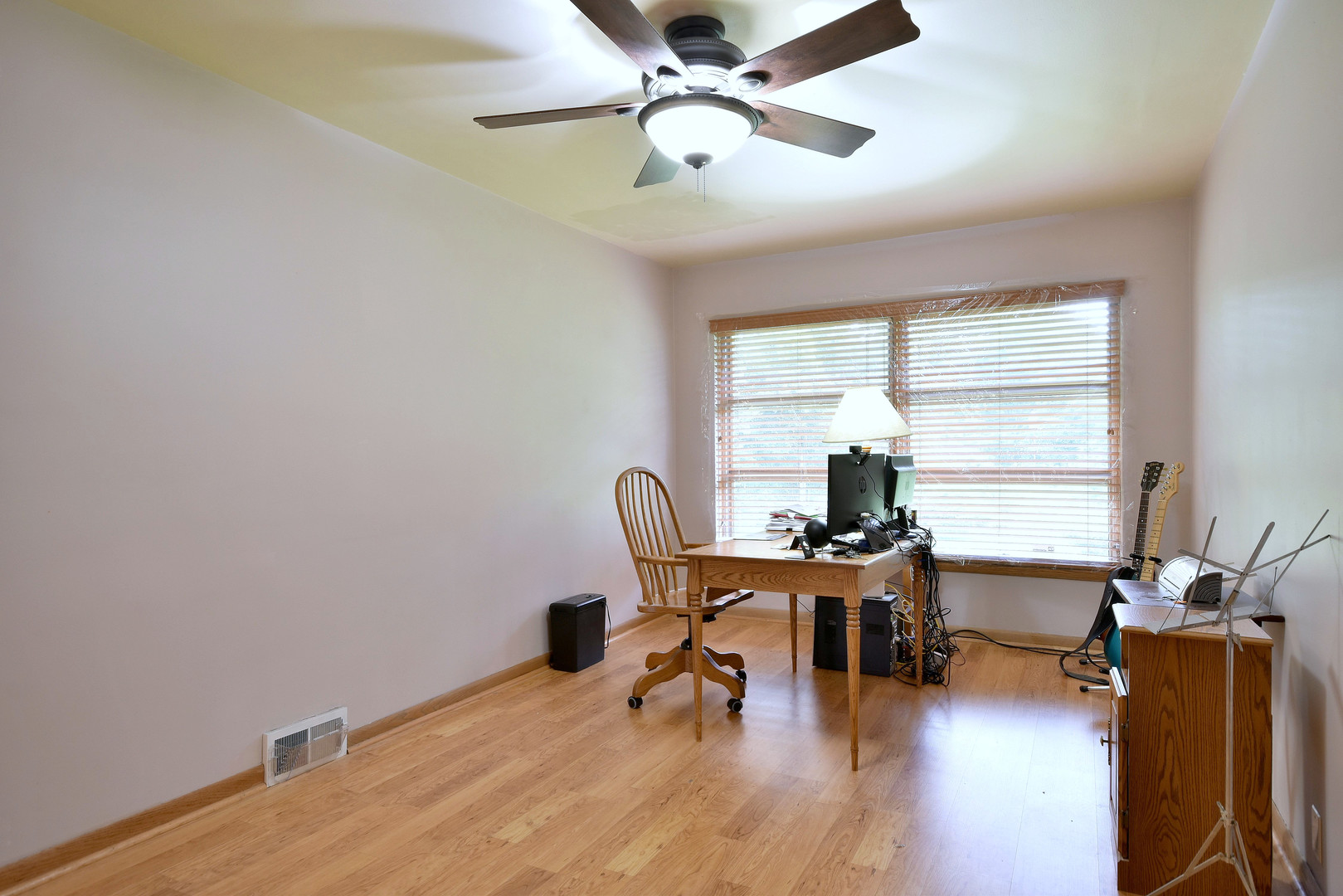 17841 Howe Avenue Homewood, IL 60430 - Photo 17 of 38 a workspace with furniture hardwood and a window