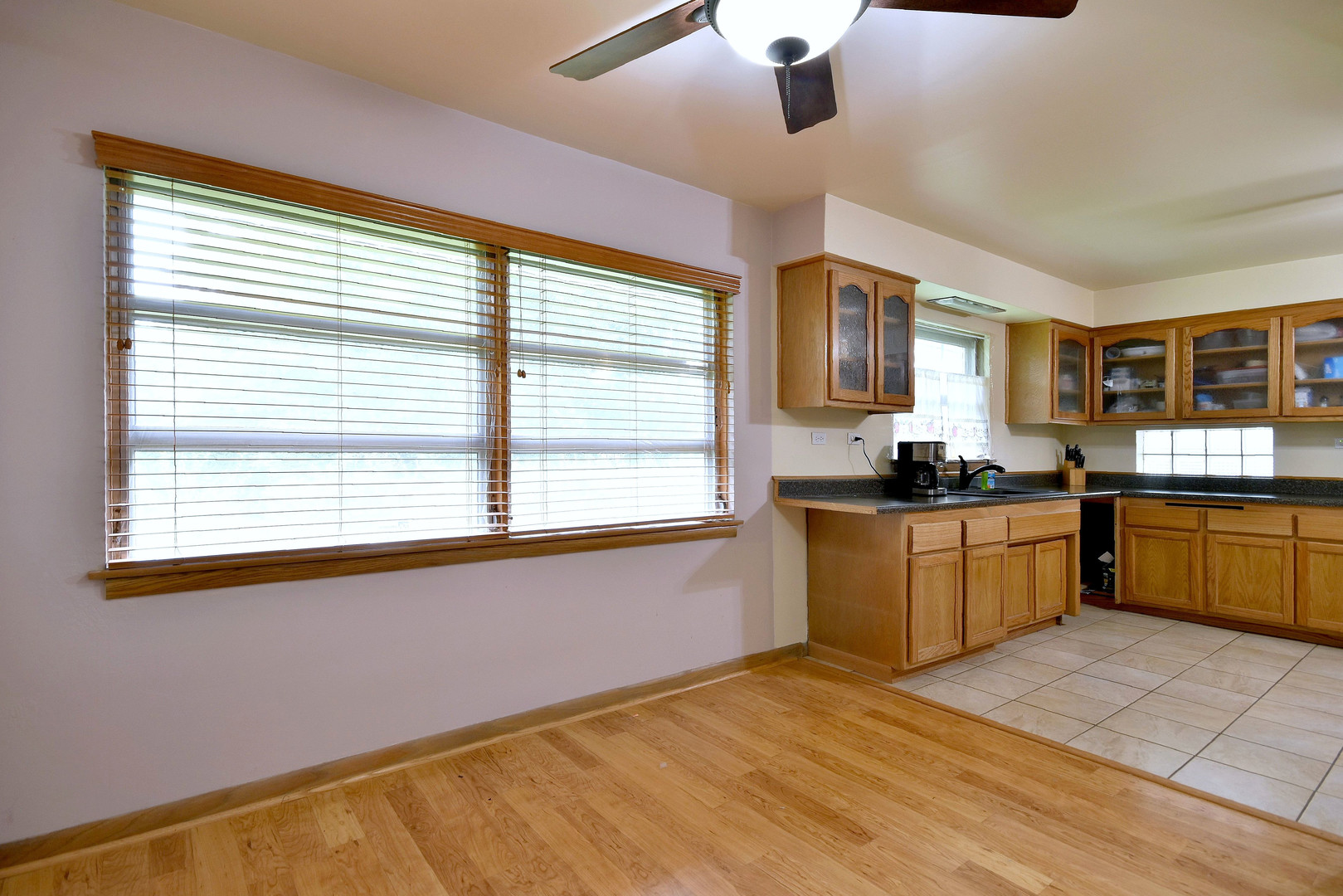 17841 Howe Avenue Homewood, IL 60430 - Photo 23 of 38 a kitchen with a window cabinets and appliances