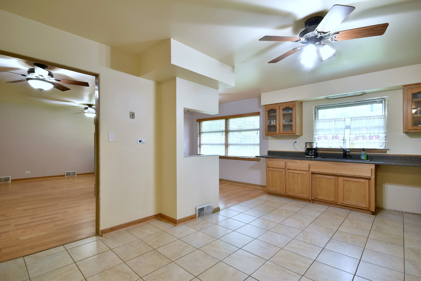 17841 Howe Avenue Homewood, IL 60430 - Photo 25 of 38 a large kitchen with a cabinets and appliances
